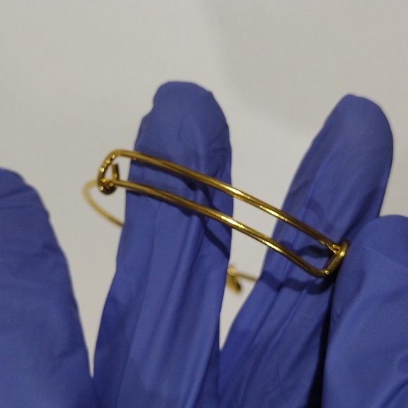 Gold Tone Expandable Bangle Bracelet with Heart Lock Charm – Elegant & Stylish - Picture 6 of 7